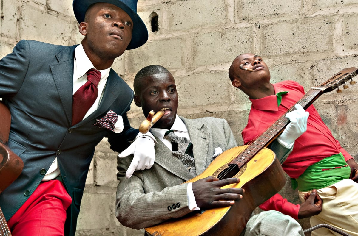 Untitled (Les Plays Boys #2)  Image: Some members of the orchestra 'Les Plays Boys' performing for Tamagni's camera. Brazzaville, Congo (2008)