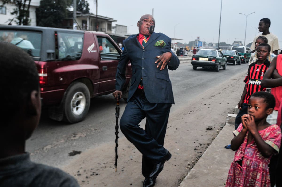 Untitled  Image: Sapeur striking a pose on the busy roads of Brazzaville, Congo (2008)