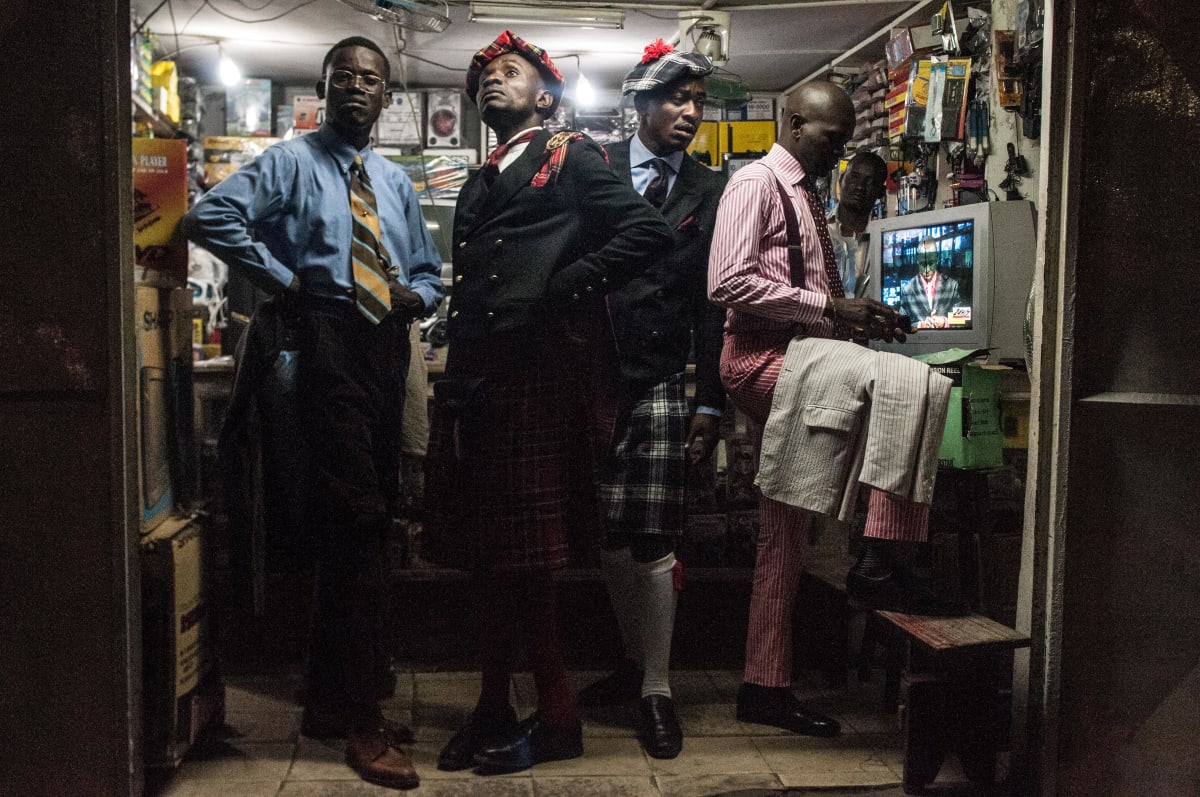 Untitled  Image: Two members of the Piccadilly group hanging out in a friend's shop with other Sapeurs. Brazzaville, Congo (2008)