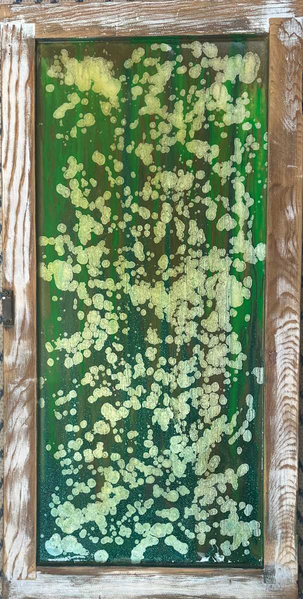Fossilized Light by Will Schmahl  Image: Encased within a weathered wooden frame, “Fossilized Light” exudes an organic and timeworn essence. 