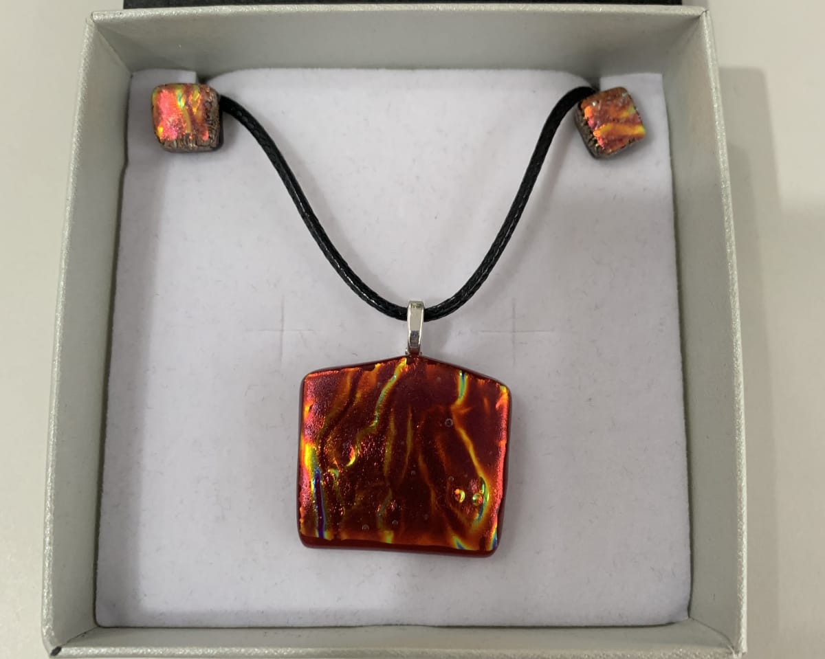 Textured Orange red pendant set by Inez Jenkins 