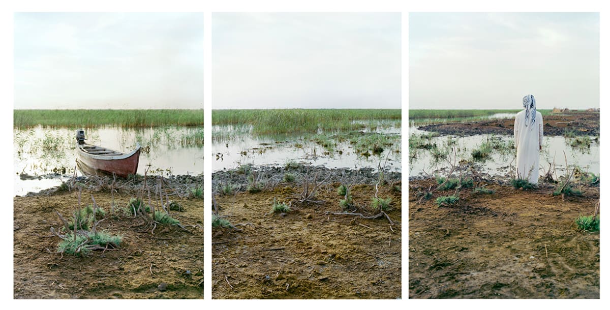 Ehmad and His Boat, Central Marshes by Meridel Rubenstein, Image 1.