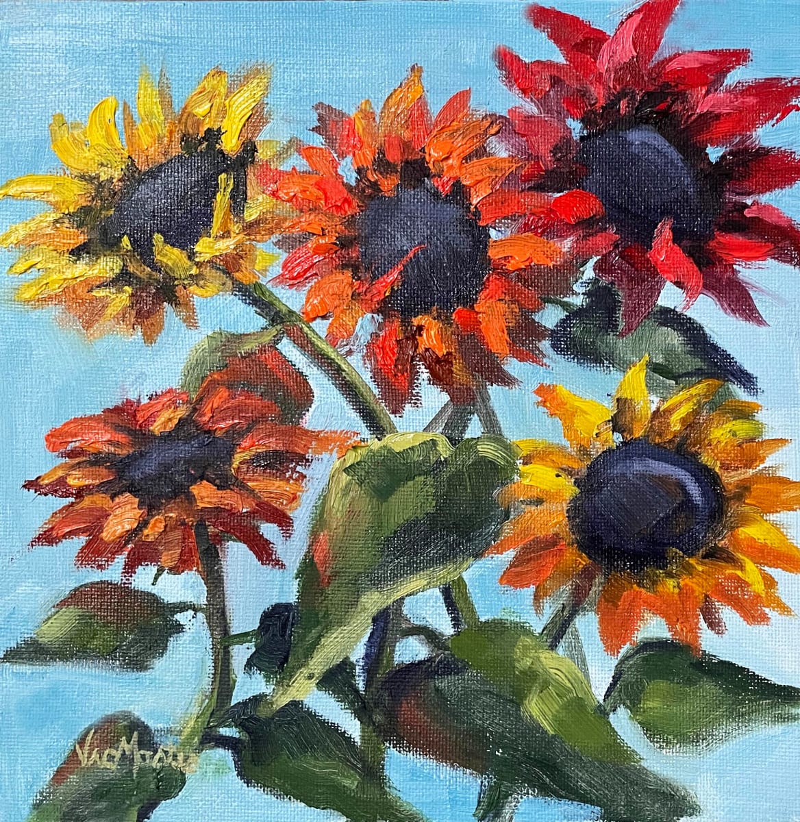 A Spark of Sunshine by Vic Mastis  Image: Brightly colored sunflowers glow in the sun.