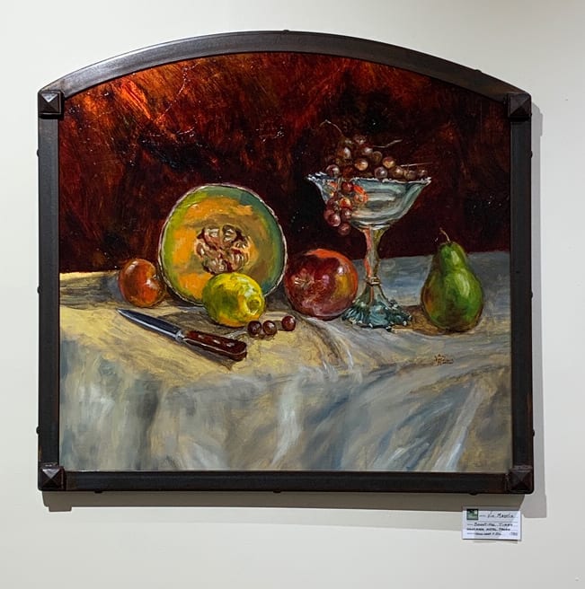 Bountiful Fruit  Image: One of my friends bought all this fruit as a present for something I did for him.  I wanted to paint his kindness!!  I layered Gold Leaf with the Oil glazes to get that glowing translucent look for for the background.  My Husband made this arched steel frame for the painting.