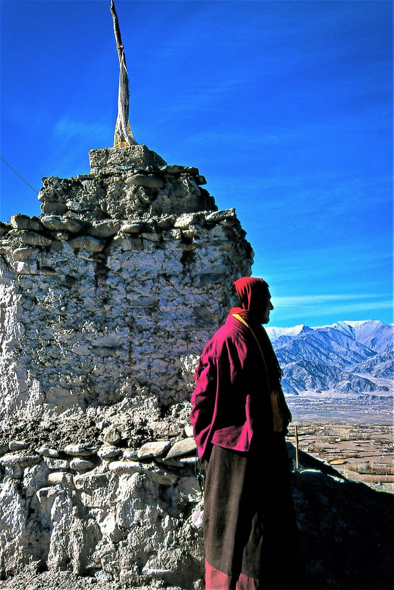 Tibetan Monk Meditating While Looking at the Great Nature by Kim Hwan 