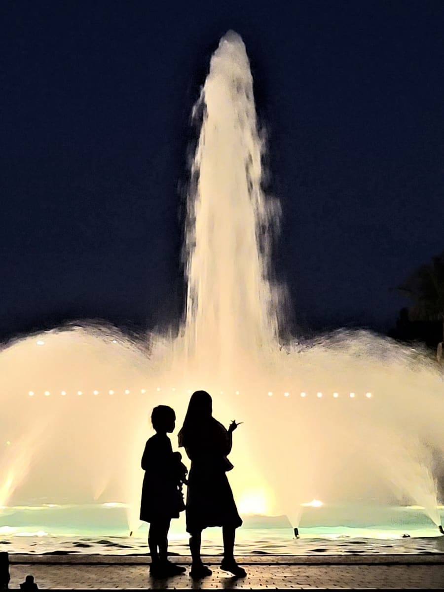 Two Children at Balboa Park Fountain by Heather Skidmore 