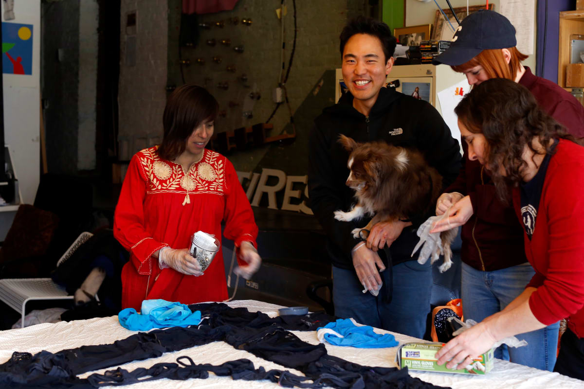 Arpillera Americanx * Cunt Quilt (Bridges) Stitch n Bitch by Coralina Rodriguez Meyer  Image: Stitch n Bitch (Bridges) participants create a Sanctuary City flag during a arpillera salon at Flux Factory in Queens NY to celebrate America's most diverse immigrant neighborhood.