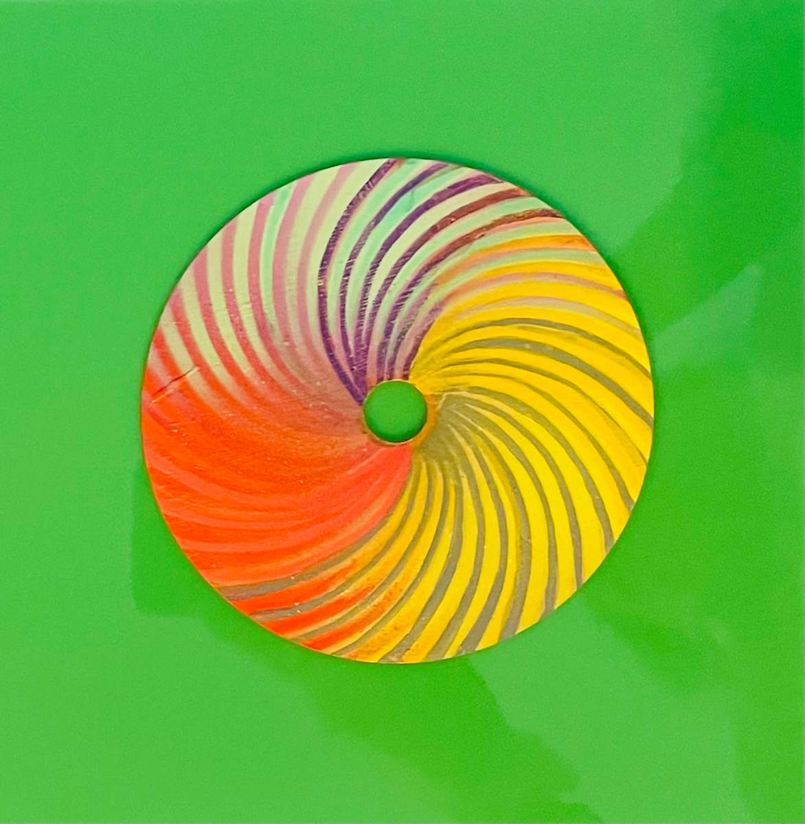 Golden Spiral by Dr. Vasundhara (Vasu) Tolia  Image: A dynamic swirling pattern that transitions from deep purple
through coral to bright yellow, with flowing curves that create a sense of movement
and energy radiating from the center.