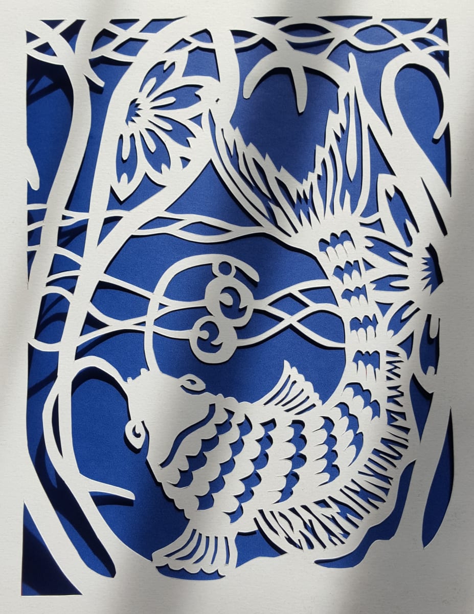 White Koi by Donna Gonzalez  Image: A white koi swimming.