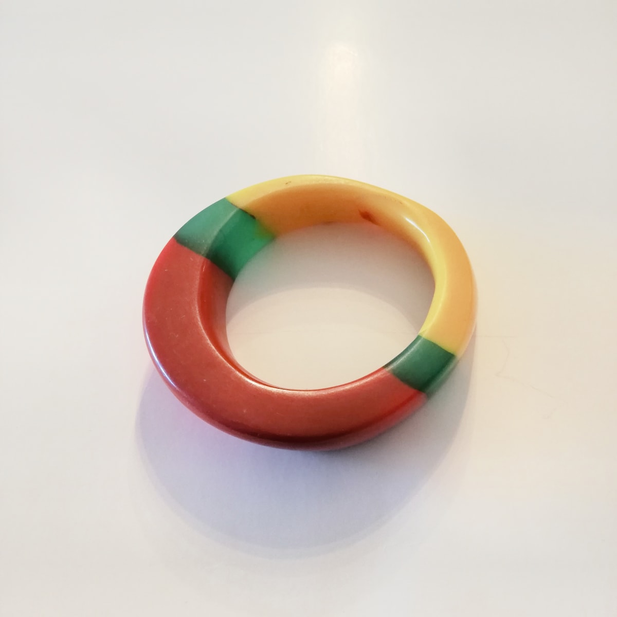 Red,black, green, yellow flat bangle  Image: Red,black, green, yellow flat bangle