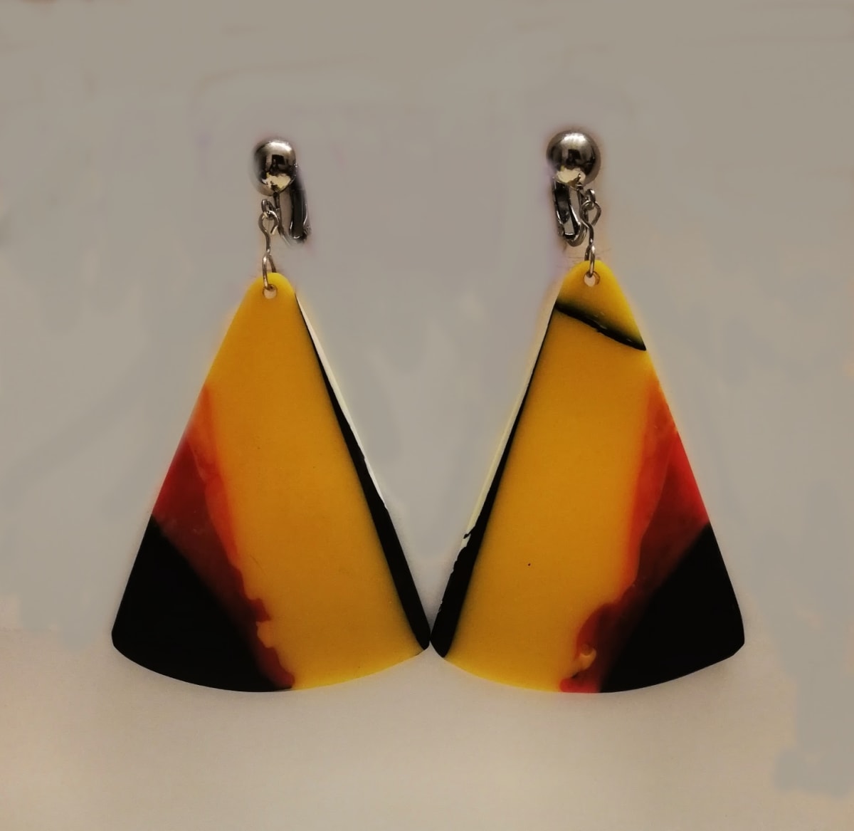 Black, yellow and red 'slice' earrings sterling silver clips  Image: Black, yellow and red 'slice' earrings sterling silver clips