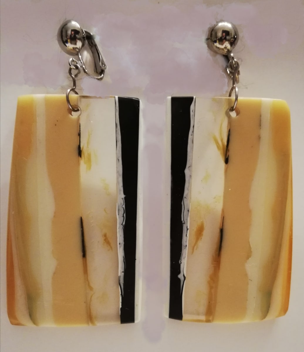 Slice Earrings by cara croninger works  Image: Ivory, black, clear polyester resin, sterling  steel clips