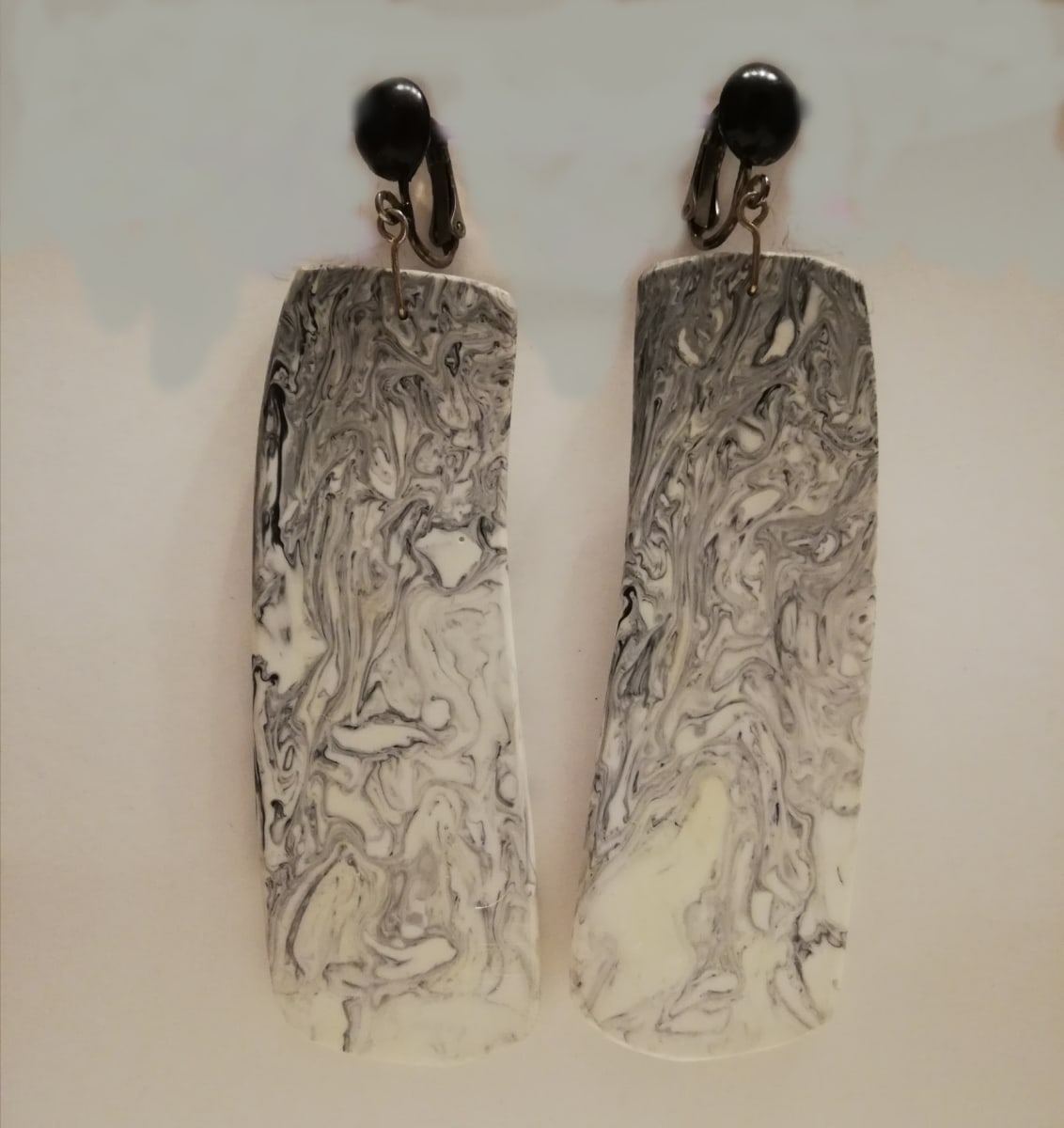 Black and white marbleized 'slice' earrings  Image: Black and white marbleized 'slice' earrings black stainless steel clips