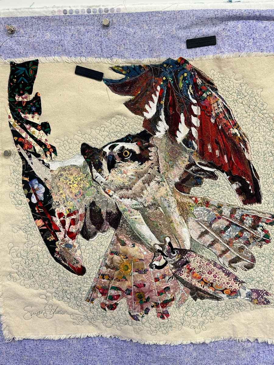 Osprey with fish. by Susan Fay Schauer Fiber Artist 