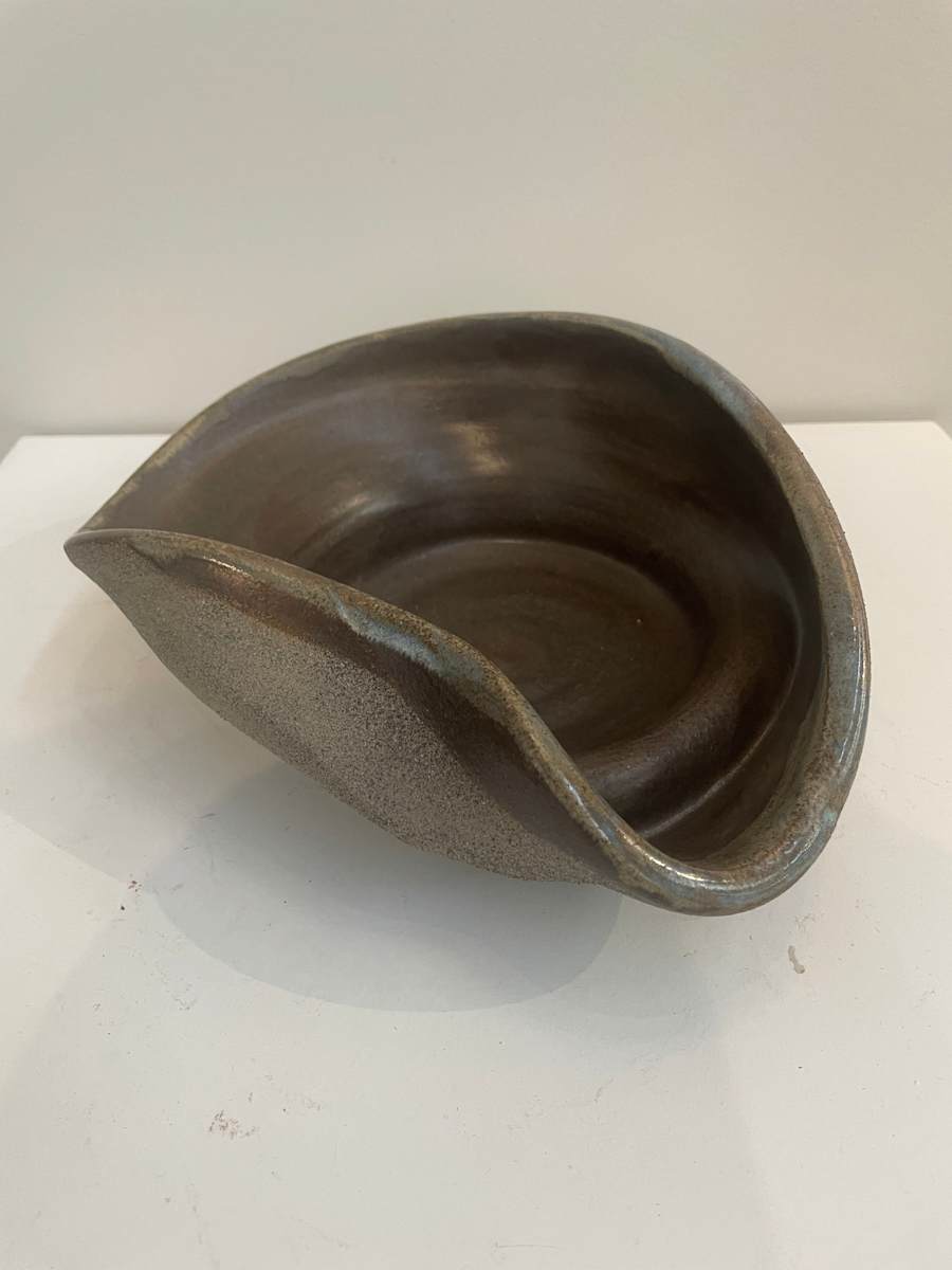 Flat in Buttery Brown by Janel Reid  Image: Flat folded bowl in Buttery Brown ceramic.