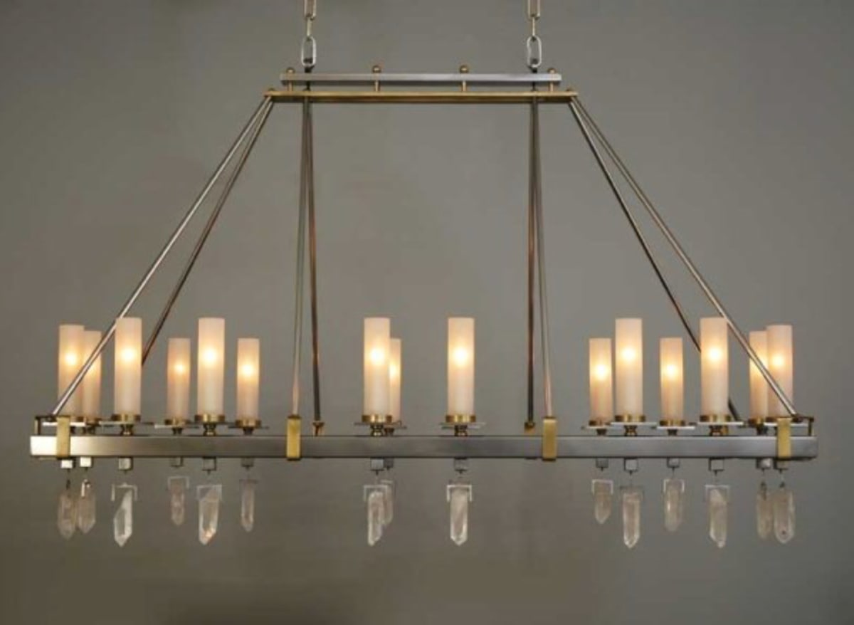 Hart Associates New Product Design - Work Experience by Bill Usher  Image: 16 Light Chandelier
Approximately 60” wide x 24” deep x 48” high
Buffed and painted steel, brushed brass, frosted globes and rock crystal