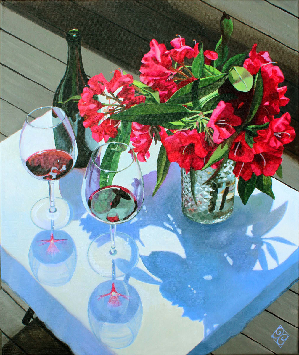Rhapsody in red by Joan Chamberlain  Image: Red rhododendron blossoms alongside glasses of cabernet wine.