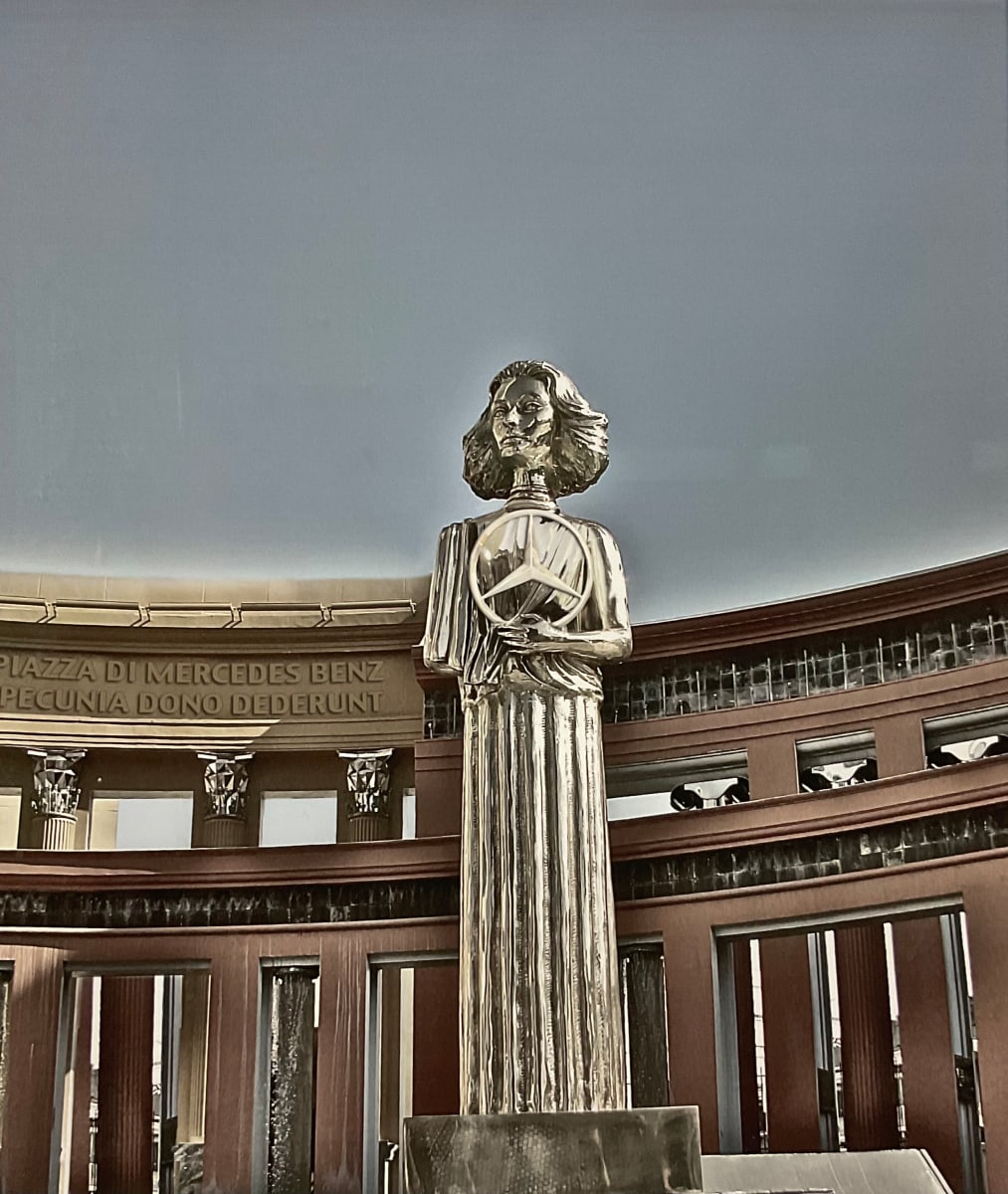Statue in plaza by UNKNOWN 
