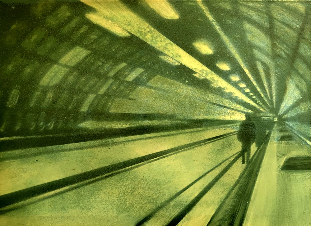London tube by Heather Lewis  Image: Traveling through a quiet underground rail tunnel at night.