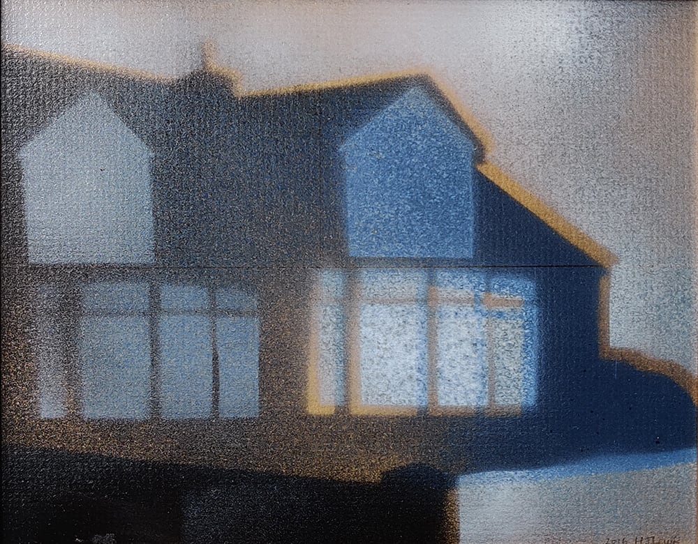 south coast night by Heather Lewis  Image: a moody night scene of a house with lighted windows against the sky