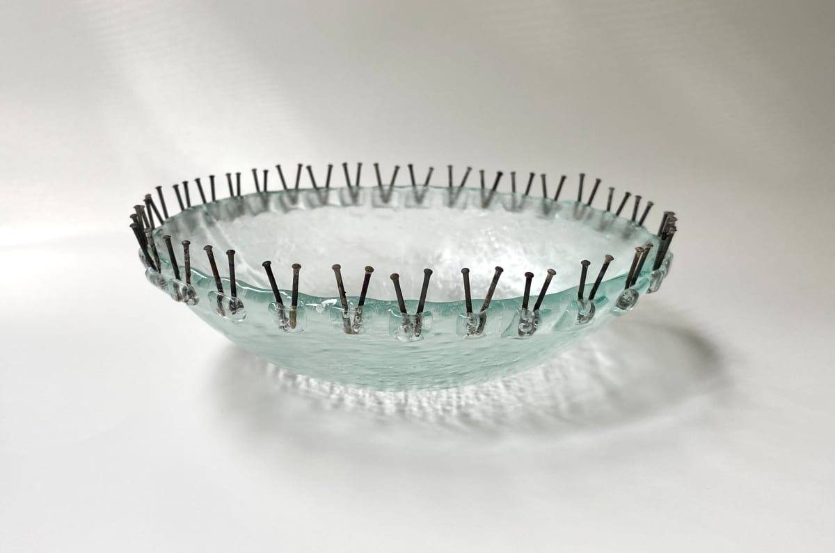 Bowl with nails by Claudia Henao 