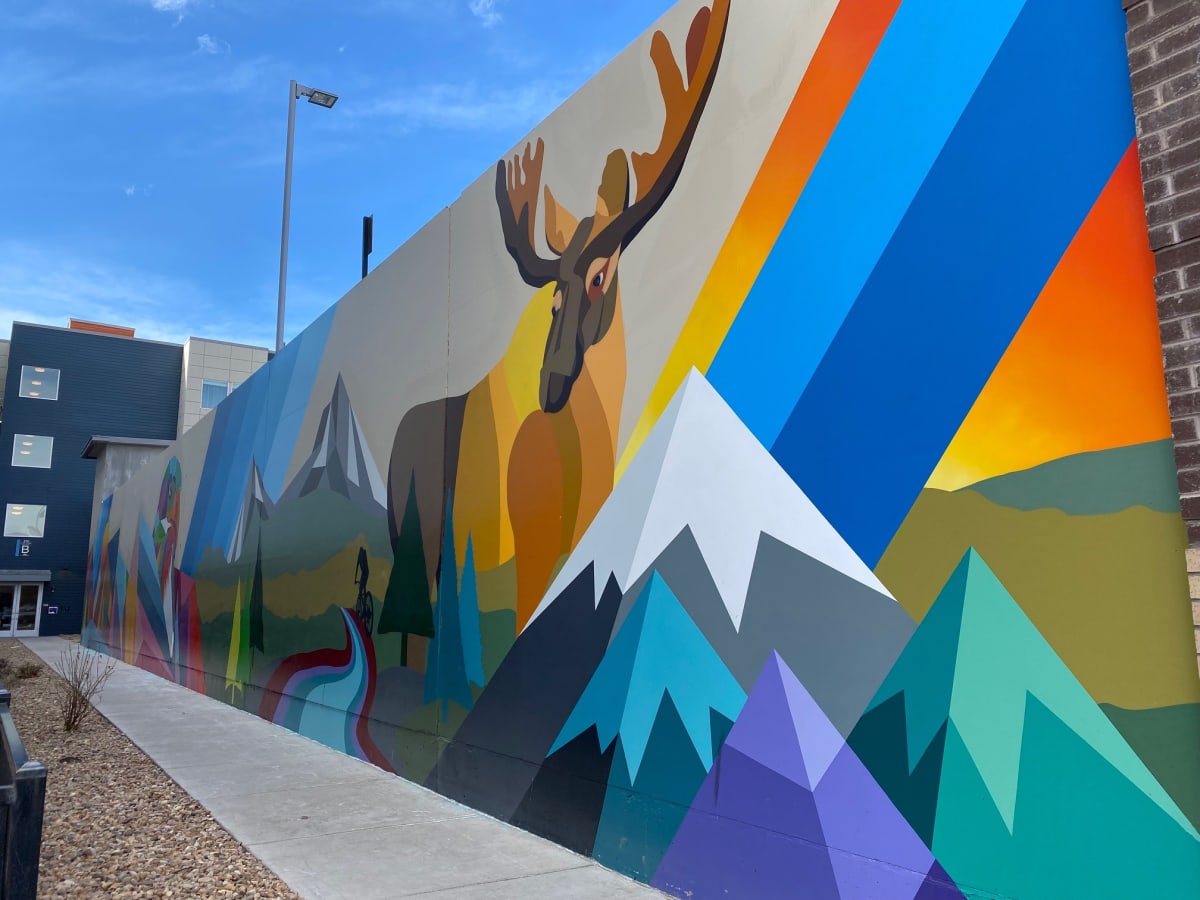 Untitled - elk & mountains by Pat Milbery  Image: "Untitled - elk & mountains" by unknown artist, 2021. Image of stylized elk and mountains, towards the right side of the mural.