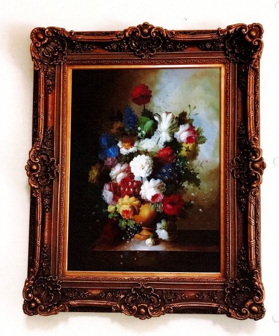 Yellow vase of flowers on a wooden table by Kay Rivaton 