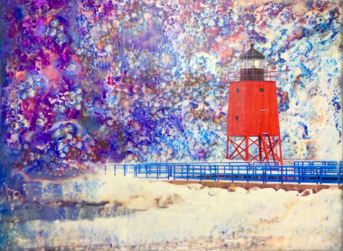 Across the Universe by Kristianne Tefft  Image: This artwork was created by torch fusing clear encaustic wax, various encaustic wax paints and oil pastels and then by burnishing images of into the wax.  The lighthouse image was taken in Petosky, MI and the “sky” image is of barnacles, taken in Florida.   