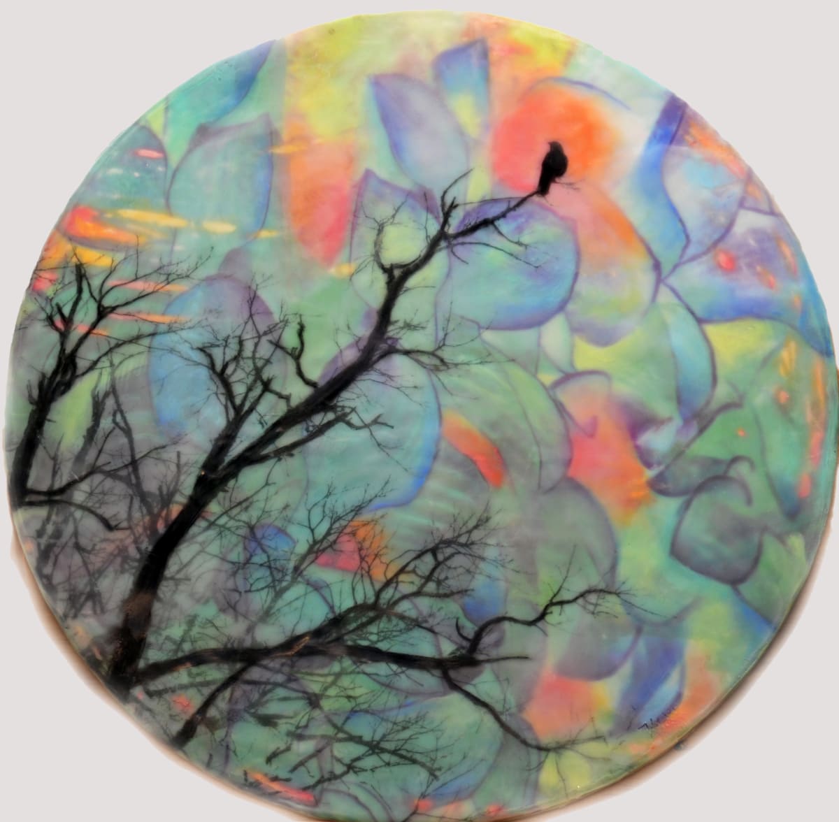 Moon Night  Image: The moon casts a magical light that turns ordinary into extraordinary.  This artwork was created by torch fusing and layering clear encaustic medium, encaustic paints, oil pastels and by burnishing digitally edited images of tulip leaves and a bird in a tree.  
