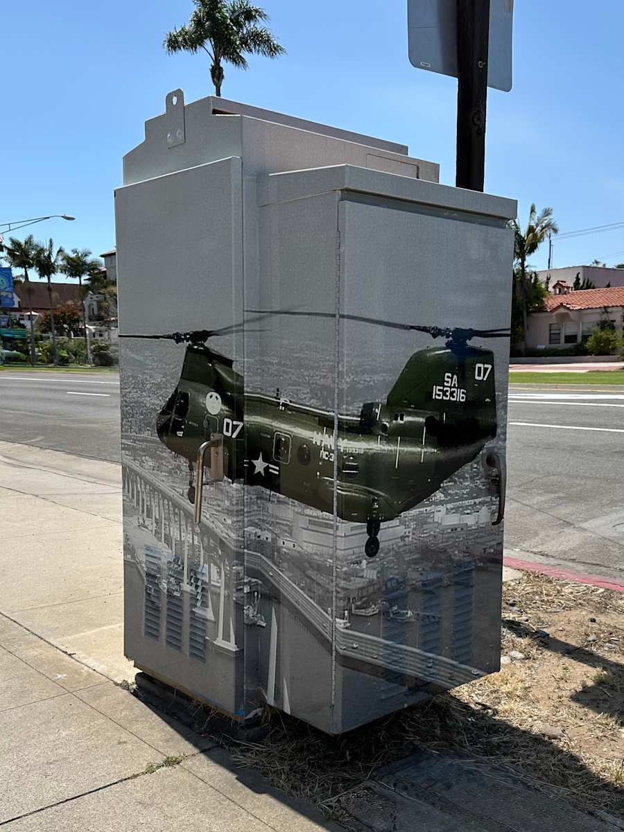 Art Outside the Box Take 2: 3rd and Orange Avenue by Griffen Wong, Juniper Clark  Image:  A Navy helicopter from Helicopter Sea Combat Squadron Three is seen above the Coronado Bridge. 1976. Coronado Historical Association Collection. Rights Reserved. 