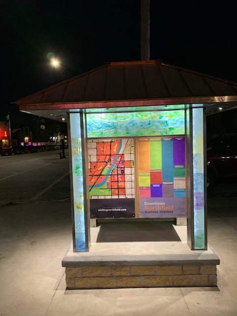 Natural Treasures of Northfield Kiosk by Richard Swearer, Howard Osterue, Keeney Swearer  Image: The kiosk illuminated at night. 2020.