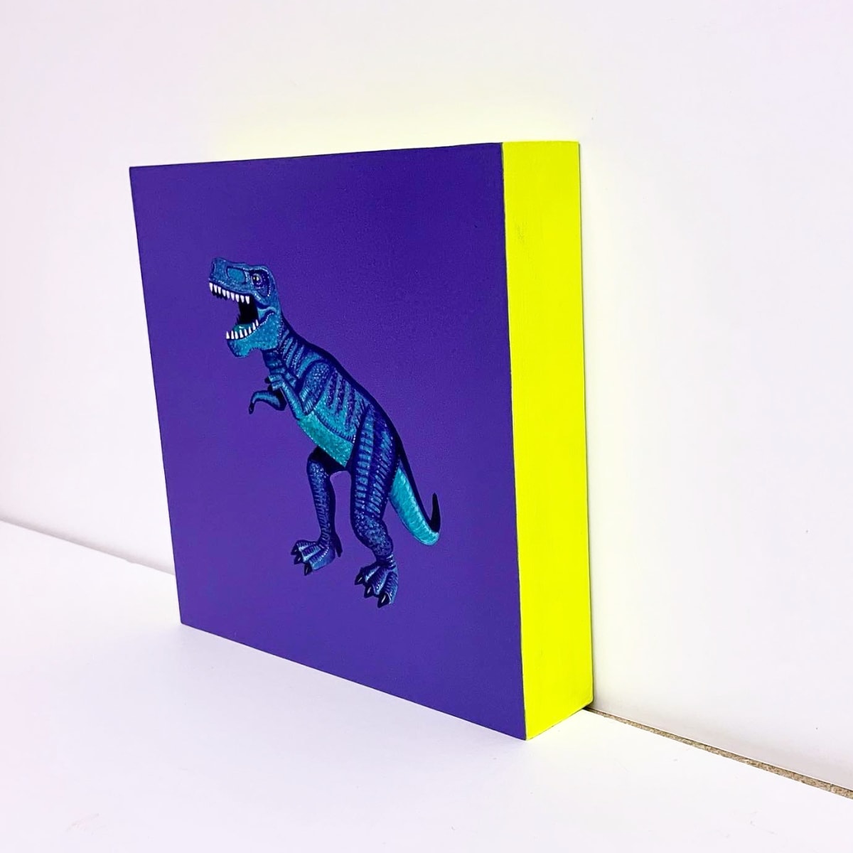Teal T.Rex on Violet 
