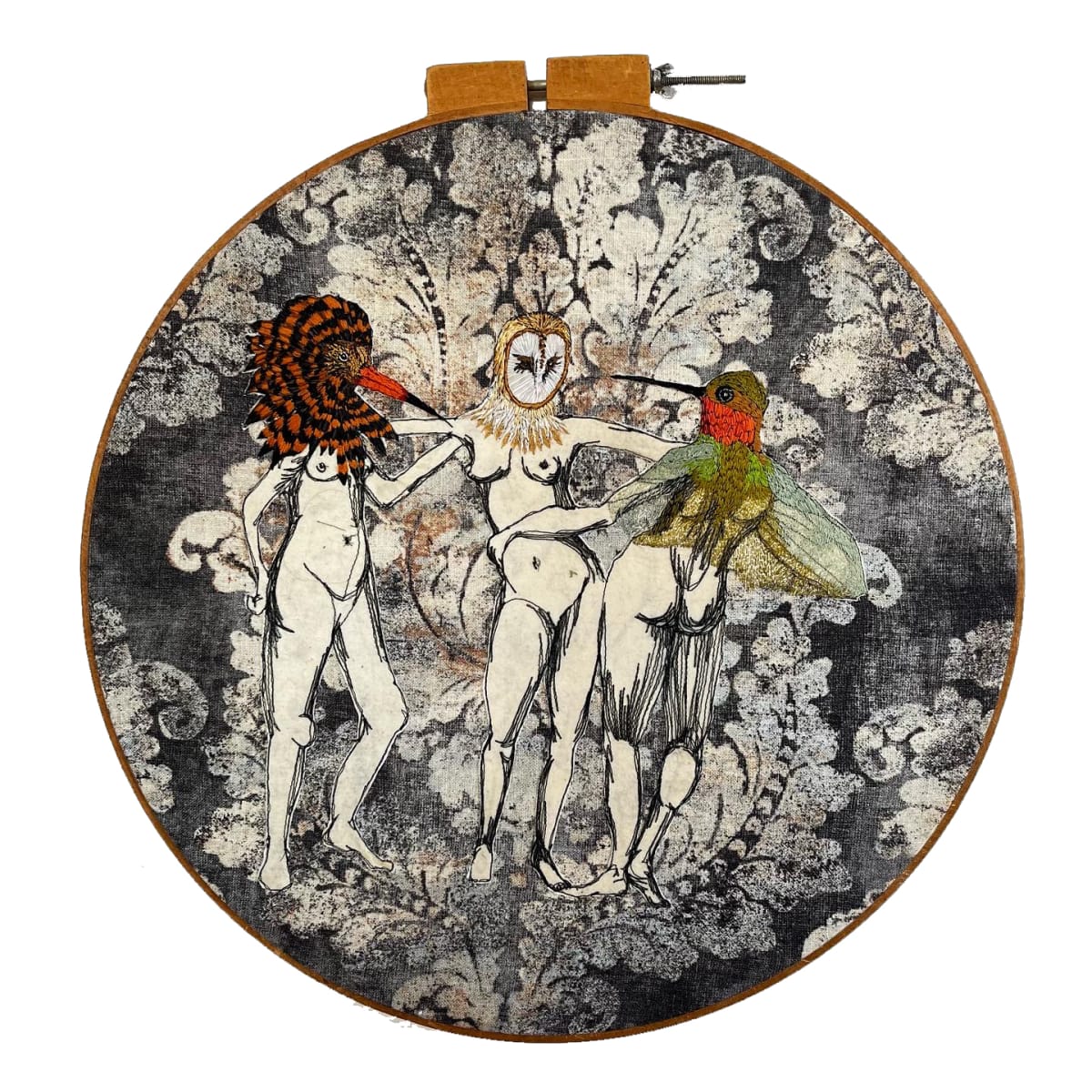 The Healing Three Graces by Jennifer McBrien  Image: The Healing Three Graces , 2022. 23" X 23" X 2", Freehand machine stitched figures with hand embroidered bird heads on decor fabric. 