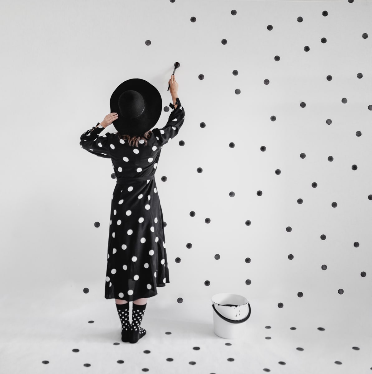 Polka Dot by Dasha Pears  Image: Infinity represents something that is boundless or endless, or else something that is larger than any real or natural number. What if you multiply infinity by its reflection, add the white to the black? It gets even more entertaining then.

This artwork was created in a collaboration with another photographer and self-portrait artist, known as Kutovakika.