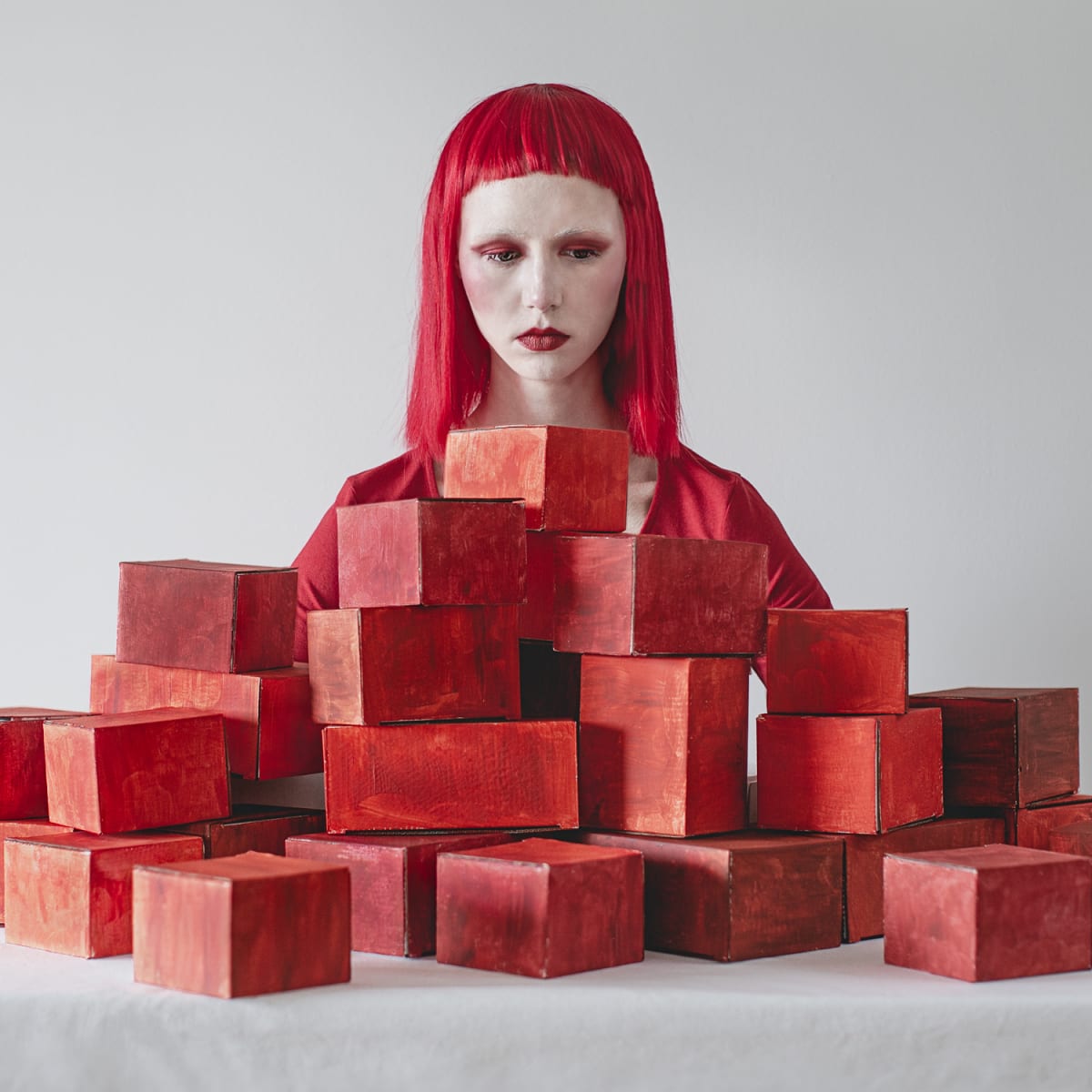 Overwhelm by Dasha Pears  Image: Psychologists argue that a human being’s character and personality are largely the results of things that happened to him/her in the course of life. Some life situations leave a deep emotional impact on us, which stays with us for years and often goes into the subconscious. We take on an emotion, usually a negative one (fear, regret, anger), and carry it with us further, not even realizing that we have it. Yet, it does affect our behavior, perceptions, thoughts, views of the world, and even health. It’s never just one experience that influences us. It’s always the combination, the layers, which with time turn into so-called “emotional baggage” burdening us. At some point, this baggage can make us feel stuck completely when we feel depressed, enormously stressed, or deeply unhappy and not being able to understand why we think the way we think and why we do the way we do.

 

Psychologists say that if you have a memory that’s more than 18 months old and that causes an extreme emotional reaction in your mind, it means that this past event is holding you back from living your life fully. Often, getting back to those painful past events, digging them from your memory and experiencing them once again in your mind, accepting them, and transforming your initial emotional reaction to them is the only way to go on living. This project reflects the process of accumulating emotional baggage and getting rid of it in the end, becoming better and wiser. Cause there’s more to life than the past. Yet, a butterfly has to be a caterpillar first.