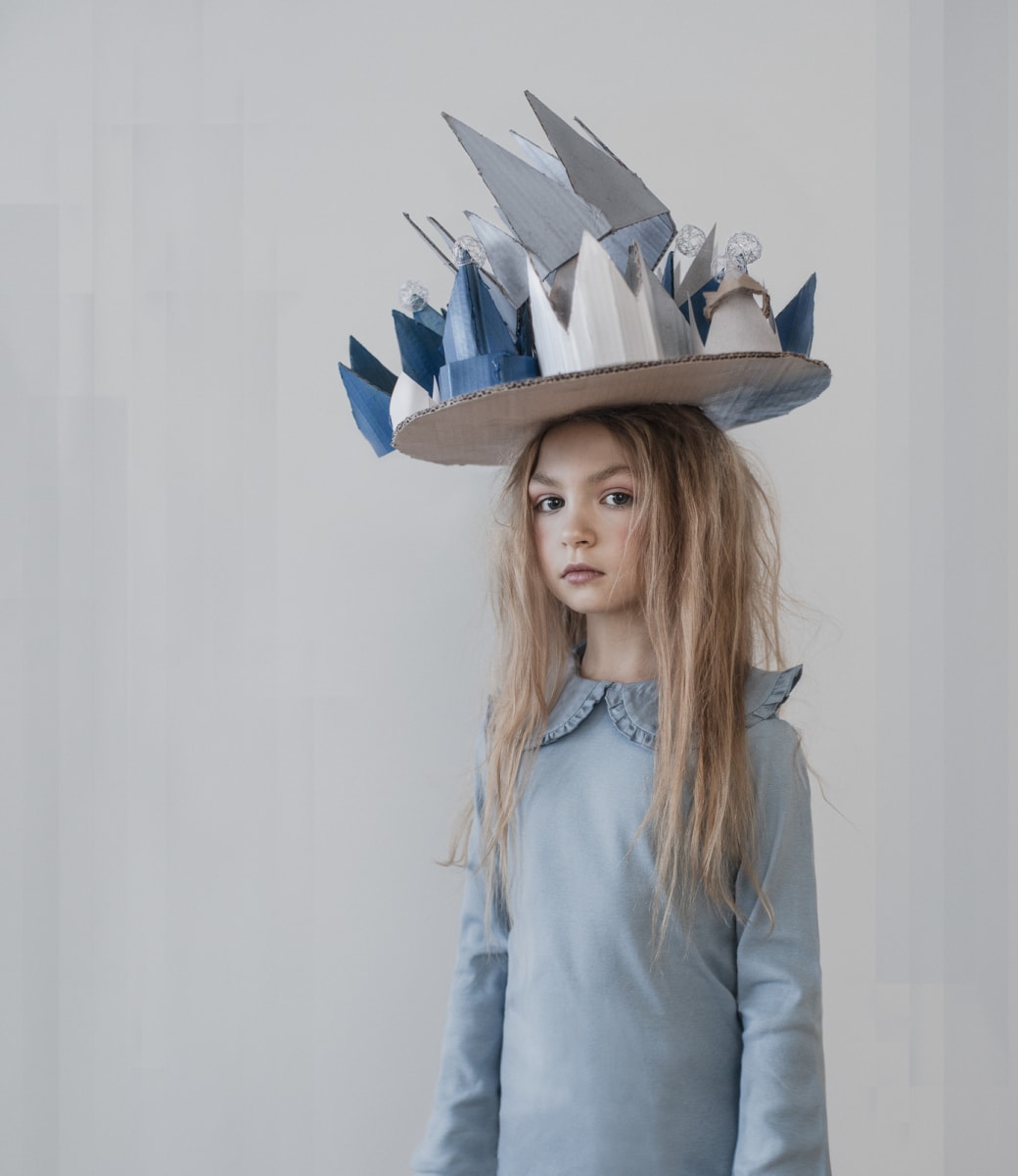 Crown by Dasha Pears  Image: The situation the whole world was in forced us to look at many things from a new perspective. The experience was painful but valuable. But you can only get a gain from your pain if you pause and take time to reflect on your actions, feelings, and thoughts. This project is a tribute to the lockdown wisdom, that each of us faced in a unique way.

 

We tried to imagine what the kids would do if they were locked down on their own in a situation similar to a pandemic version of "the Lord of the Flies" story. No parents, no rules, but not too much freedom either. So in our narrative, the kids make themselves the kings and queens of their lockdown home kingdom using paper and toys to create their symbols of power. Those symbols are fragile, they don't last long and are easily broken. But isn't it true for anything in life? Any habits, ways, things we get so much used to can disappear in a second. 