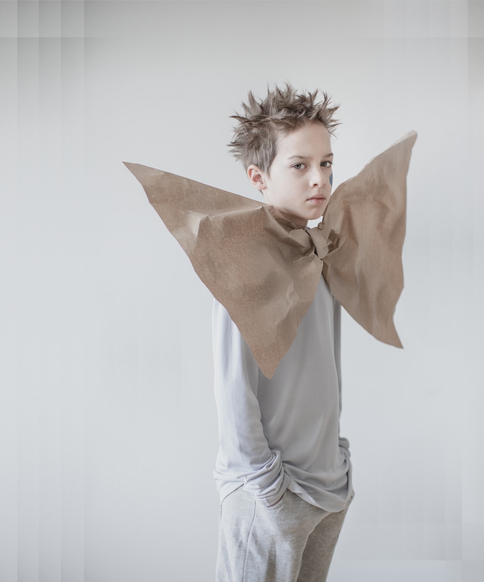 Heroes Are Loners by Dasha Pears  Image: The situation the whole world was in forced us to look at many things from a new perspective. The experience was painful but valuable. But you can only get a gain from your pain if you pause and take time to reflect on your actions, feelings, and thoughts. This project is a tribute to the lockdown wisdom, that each of us faced in a unique way.

 

We tried to imagine what the kids would do if they were locked down on their own in a situation similar to a pandemic version of "the Lord of the Flies" story. No parents, no rules, but not too much freedom either. So in our narrative, the kids make themselves the kings and queens of their lockdown home kingdom using paper and toys to create their symbols of power. Those symbols are fragile, they don't last long and are easily broken. But isn't it true for anything in life? Any habits, ways, things we get so much used to can disappear in a second. 