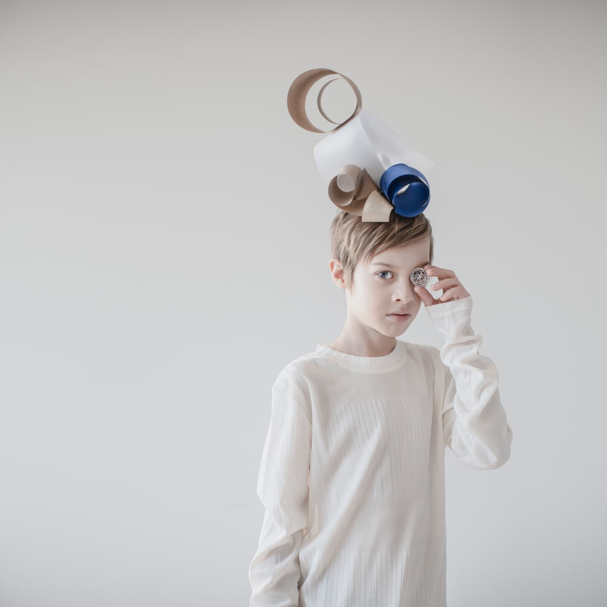 See Through by Dasha Pears  Image: The situation the whole world was in forced us to look at many things from a new perspective. The experience was painful but valuable. But you can only get a gain from your pain if you pause and take time to reflect on your actions, feelings, and thoughts. This project is a tribute to the lockdown wisdom, that each of us faced in a unique way.

 

We tried to imagine what the kids would do if they were locked down on their own in a situation similar to a pandemic version of "the Lord of the Flies" story. No parents, no rules, but not too much freedom either. So in our narrative, the kids make themselves the kings and queens of their lockdown home kingdom using paper and toys to create their symbols of power. Those symbols are fragile, they don't last long and are easily broken. But isn't it true for anything in life? Any habits, ways, things we get so much used to can disappear in a second. 