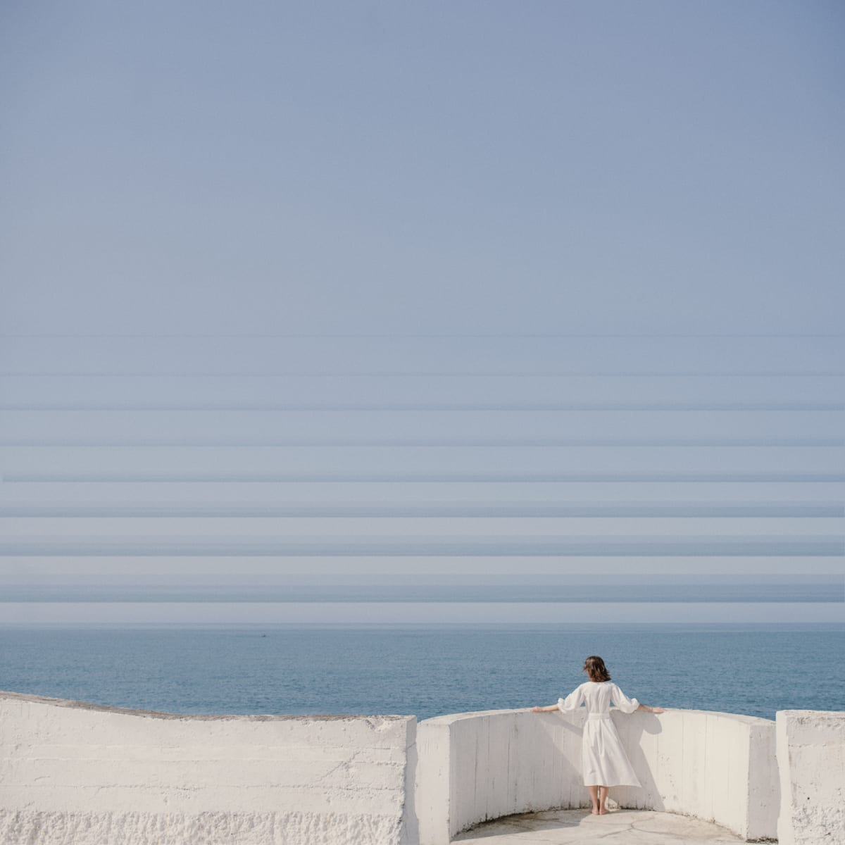 Into The Blue by Dasha Pears  Image: Melting away into the blue. Losing all thoughts, desires, and goals. Just blending with the sky and becoming a drop in the ocean.