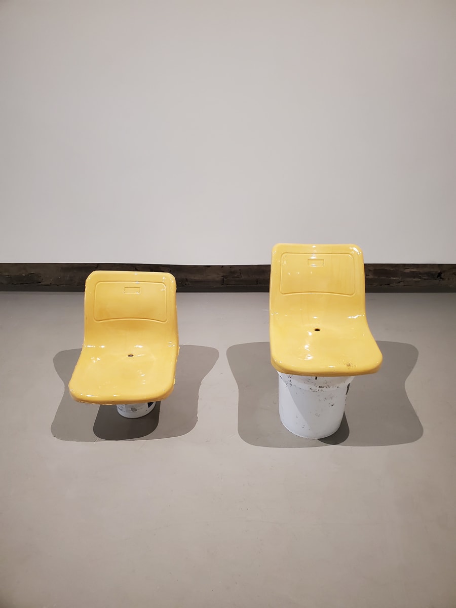 Two Seats, Two Buckets by Abed Elmajid Shalabi 