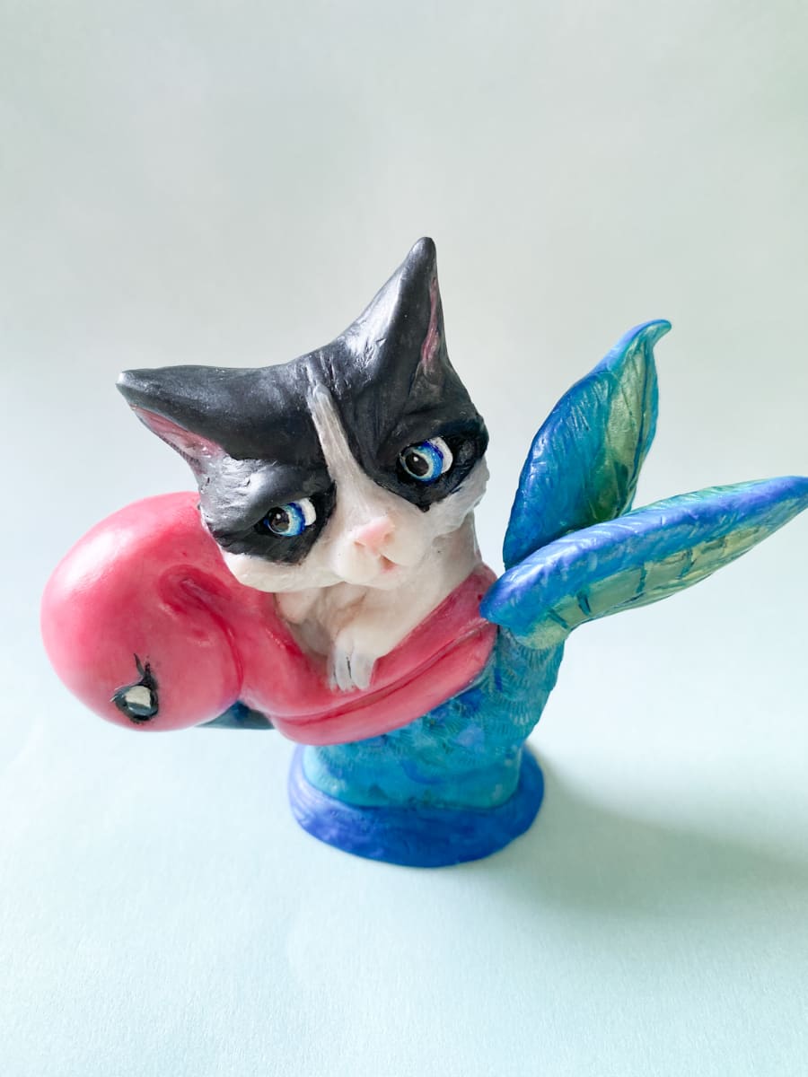 Purrmaid Figurine by Marie Young  Image: This original, hand-sculpted black and white cat figurine is modeled after my cat Lucy.