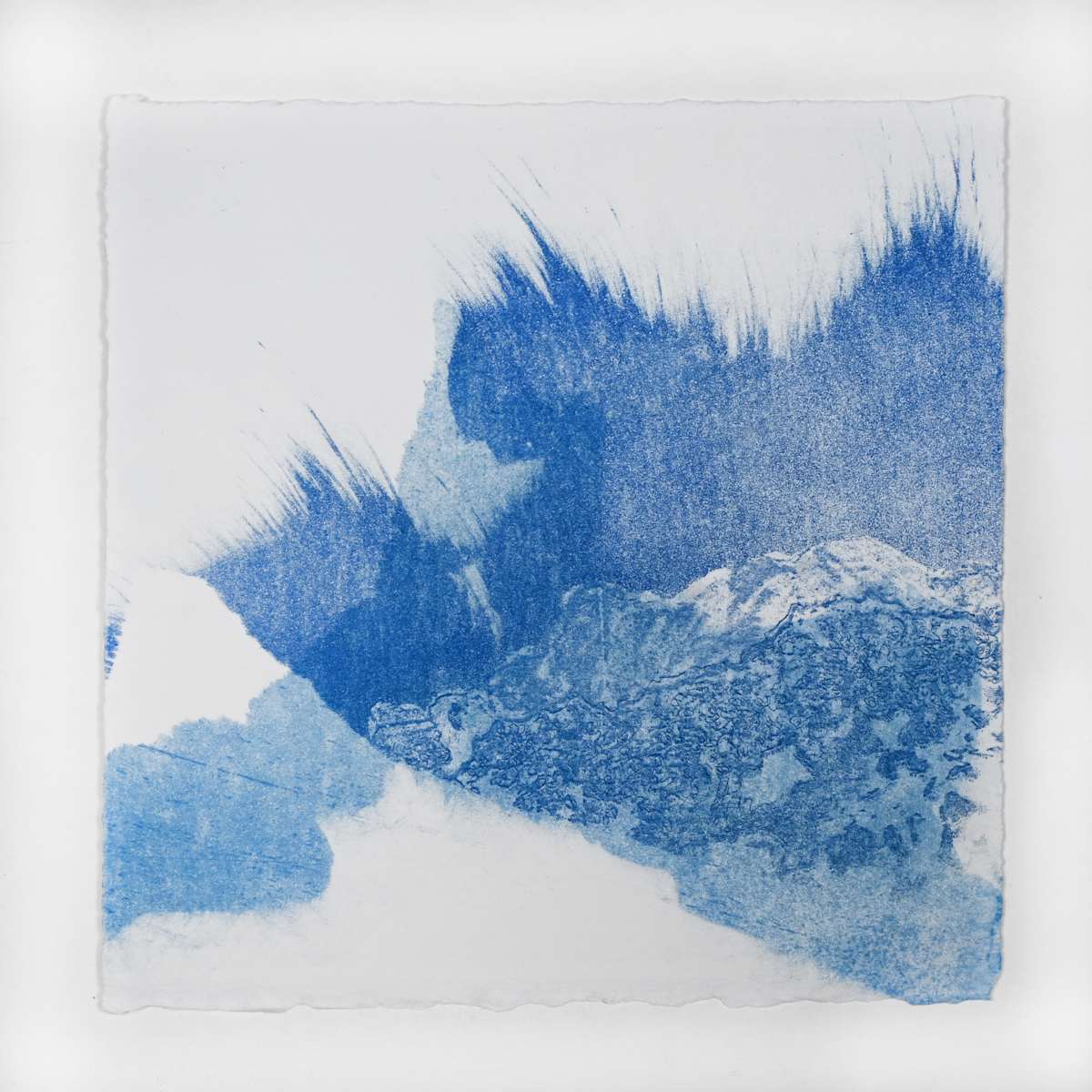 Ice Watch Studies #57 by Megan Broughton  Image: A series of experimental etchings evoking atmospheric Arctic seascapes. These pieces were made in memory of ice watches during the MaréMotrice artist residency in Greenland, sailing through foggy fjords. They function like a brilliant, shapeshifting, reveal through the fog and play with Arctic mirages and cause tricks of the eye. There are moments of clear detail and sublime wonder amidst fragmentation. Two etching plates were printed over each other multiple times in different orientations to create new and abstracted imagery. Stencils made of torn newsprint were used to block ink during the printing process, creating the white shapes throughout the works. The stencils were continually torn apart and reused throughout the series so that the stencil shapes become self-referential but are constantly transforming and deteriorating. 