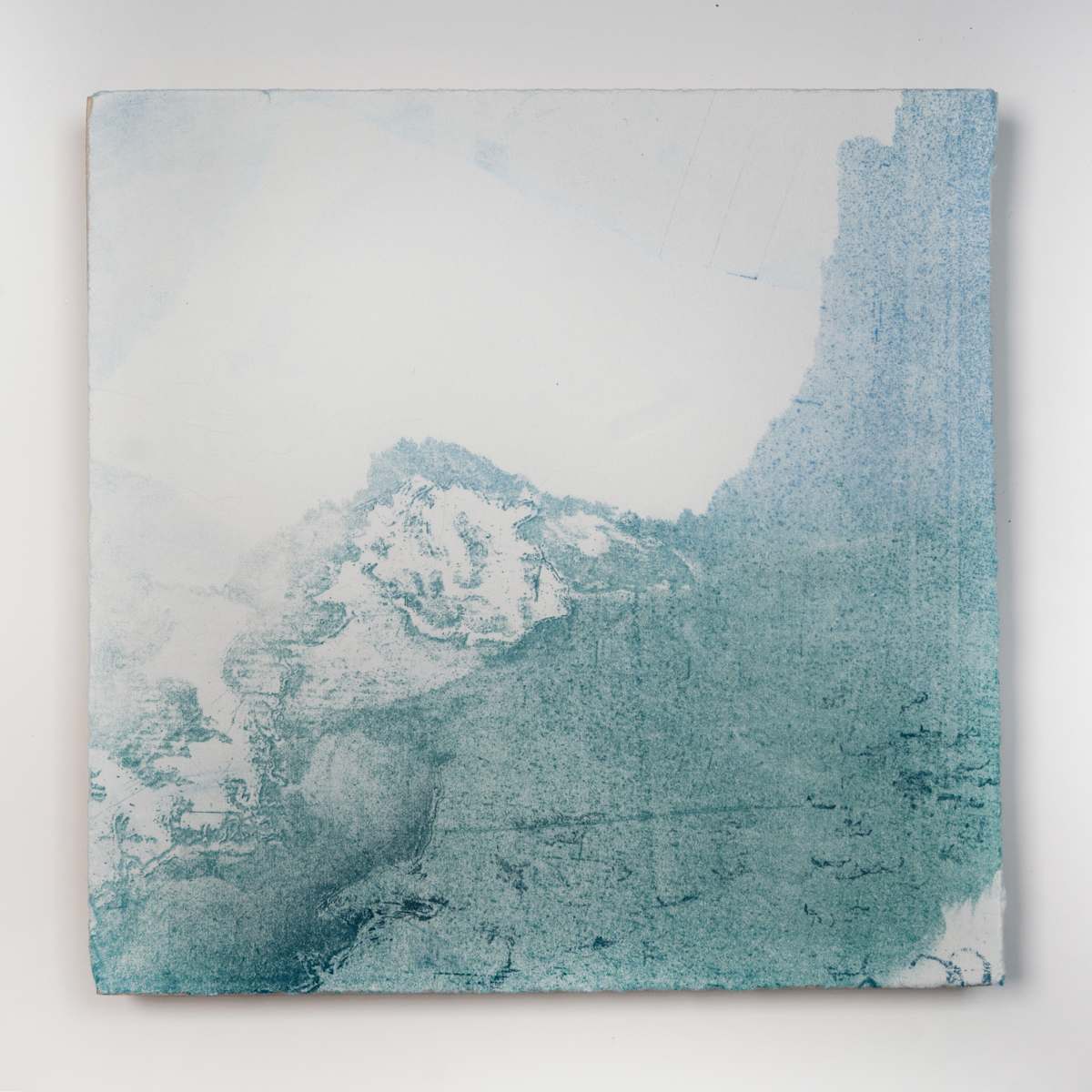 Ice Watch Studies #24 by Megan Broughton  Image: A series of experimental etchings evoking atmospheric Arctic seascapes. These pieces were made in memory of ice watches during the MaréMotrice artist residency in Greenland, sailing through foggy fjords. They function like a brilliant, shapeshifting, reveal through the fog and play with Arctic mirages and cause tricks of the eye. There are moments of clear detail and sublime wonder amidst fragmentation. Two etching plates were printed over each other multiple times in different orientations to create new and abstracted imagery. Stencils made of torn newsprint were used to block ink during the printing process, creating the white shapes throughout the works. The stencils were continually torn apart and reused throughout the series so that the stencil shapes become self-referential but are constantly transforming and deteriorating. Mounted on a cradled wooden panel.