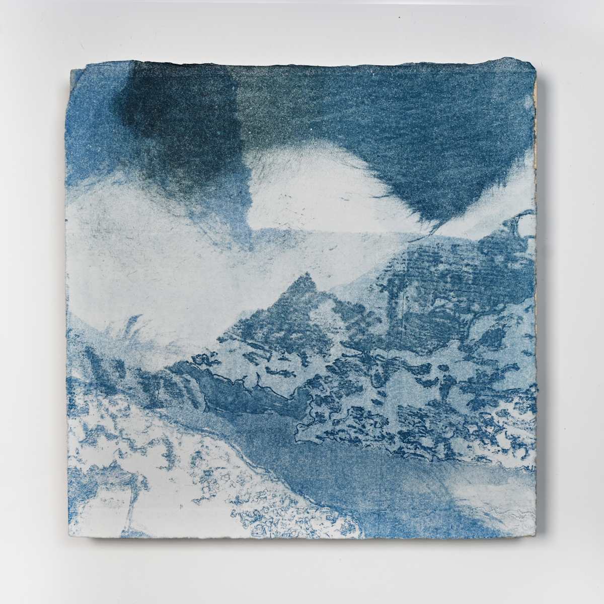 Ice Watch Studies #49 by Megan Broughton  Image: A series of experimental etchings evoking atmospheric Arctic seascapes. These pieces were made in memory of ice watches during the MaréMotrice artist residency in Greenland, sailing through foggy fjords. They function like a brilliant, shapeshifting, reveal through the fog and play with Arctic mirages and cause tricks of the eye. There are moments of clear detail and sublime wonder amidst fragmentation. Two etching plates were printed over each other multiple times in different orientations to create new and abstracted imagery. Stencils made of torn newsprint were used to block ink during the printing process, creating the white shapes throughout the works. The stencils were continually torn apart and reused throughout the series so that the stencil shapes become self-referential but are constantly transforming and deteriorating. Mounted on a cradled wooden panel.