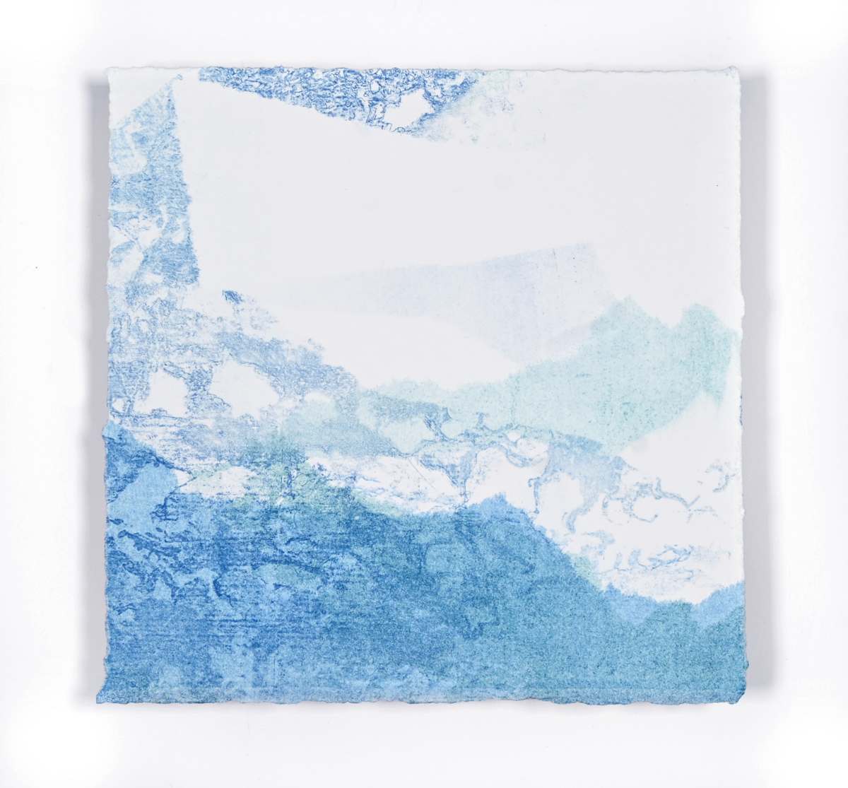 Ice Watch Studies #79 by Megan Broughton  Image: A series of experimental etchings evoking atmospheric Arctic seascapes. These pieces were made in memory of ice watches during the MaréMotrice artist residency in Greenland, sailing through foggy fjords. They function like a brilliant, shapeshifting, reveal through the fog and play with Arctic mirages and cause tricks of the eye. There are moments of clear detail and sublime wonder amidst fragmentation. Two etching plates were printed over each other multiple times in different orientations to create new and abstracted imagery. Stencils made of torn newsprint were used to block ink during the printing process, creating the white shapes throughout the works. The stencils were continually torn apart and reused throughout the series so that the stencil shapes become self-referential but are constantly transforming and deteriorating. 