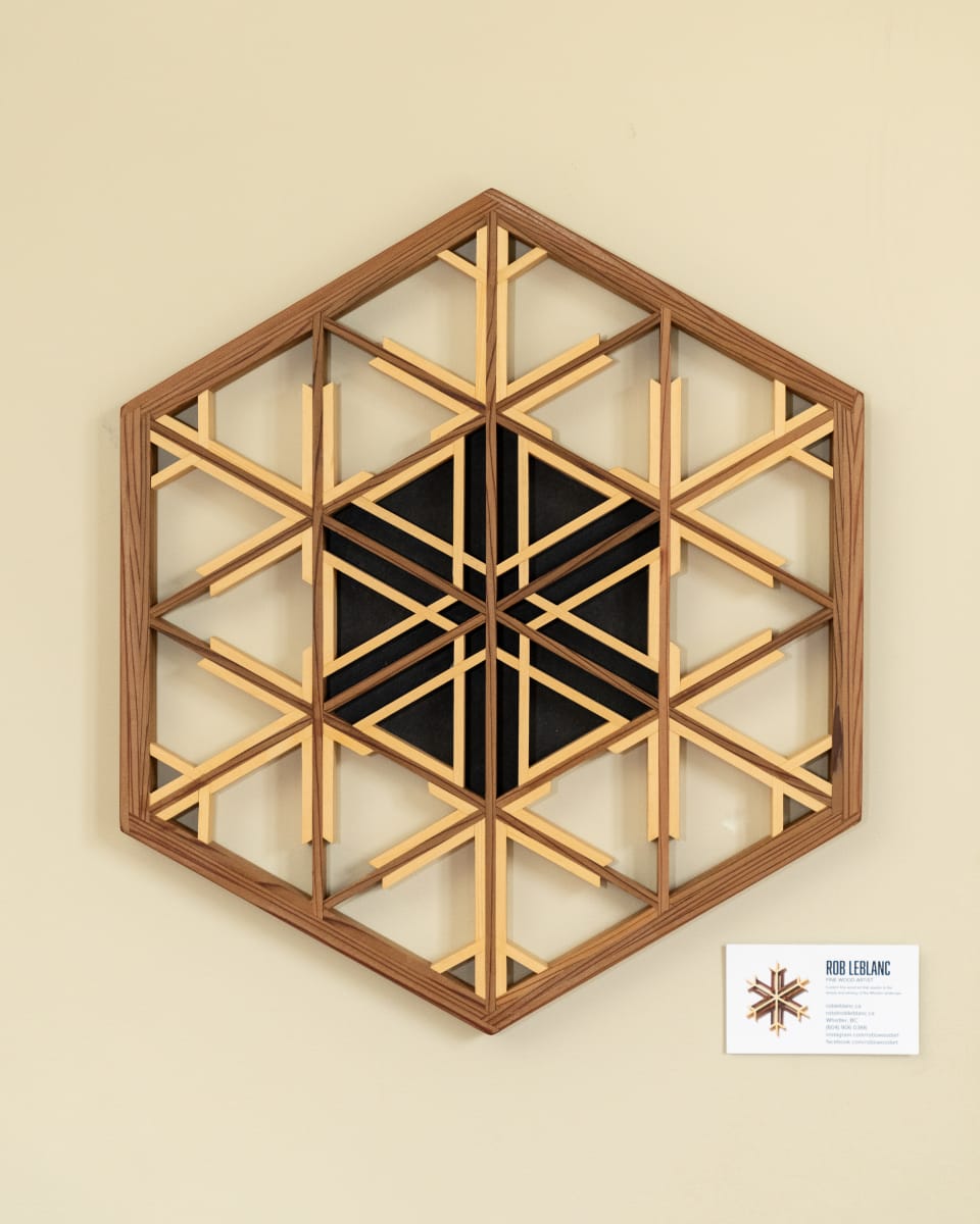 Burst by Robert E LeBlanc  Image: Made from Red & Yellow Cedar. My first use of triangular outlines in a snowflake.