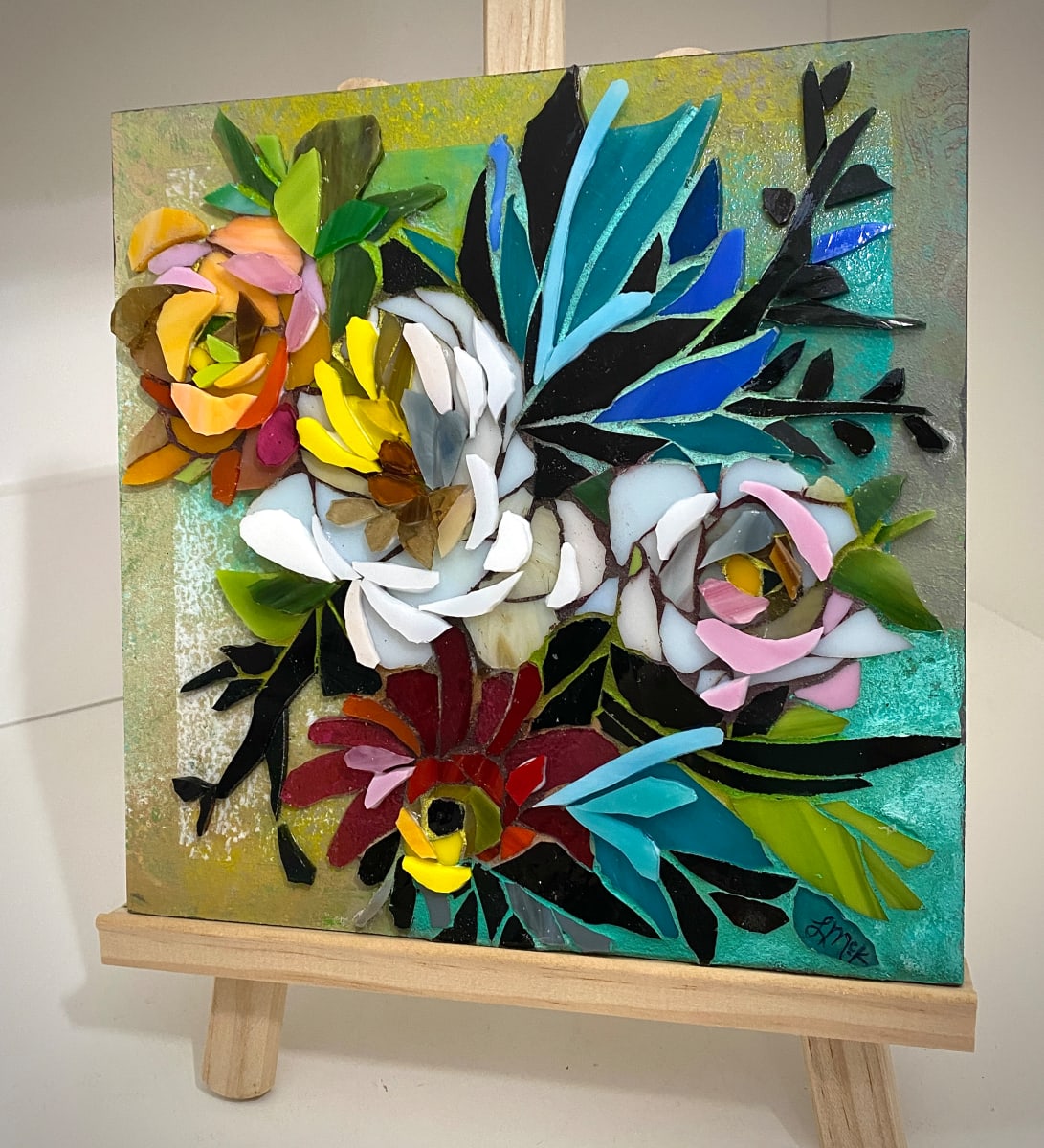 Needed Drama by Laura McKellar  Image: A dramatic floral bouquet in layered stained glass
