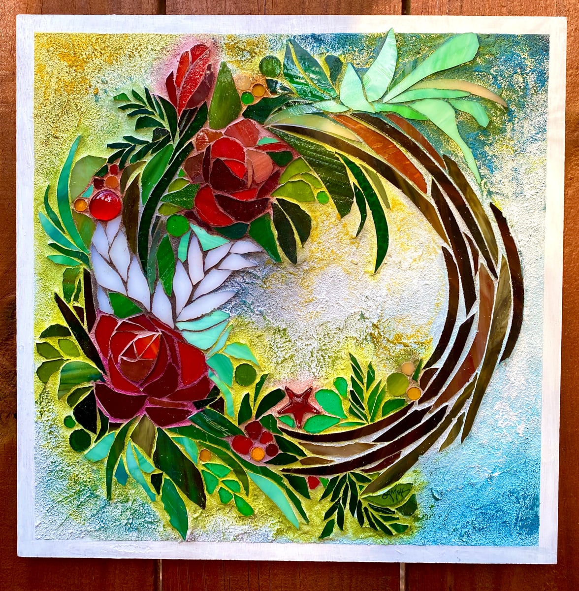 Yuletide by Laura McKellar  Image: A Christmas wreath in stained glass with painted grout.
