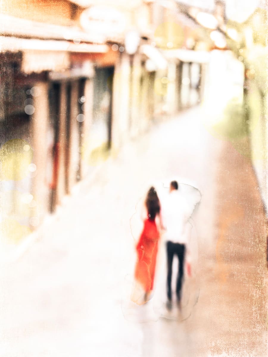 Dressed for Venice by Wendy Baker  Image: Couple in evening wear walking along narrow street in Venice, Italy