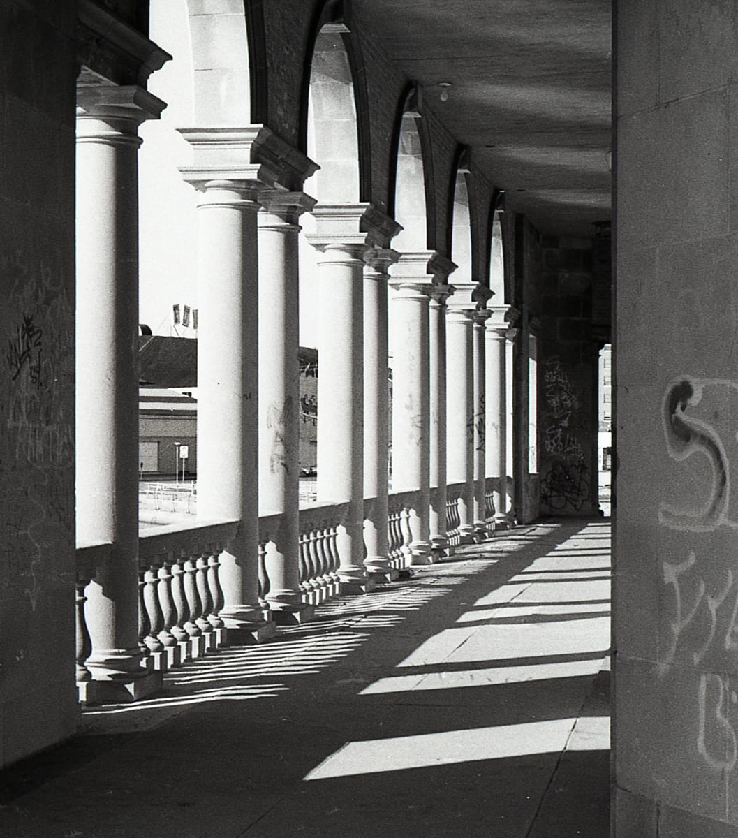 Funhouse through Columns by Mary O'Malley-Joyce 